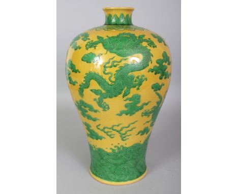 A CHINESE YELLOW GROUND ENAMELLED MEIPING PORCELAIN VASE, decorated in green with dragons amidst flame and cloud scrolls and 