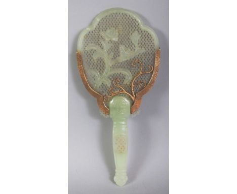 A CHINESE CELADON JADE & GILT METAL HAND-MIRROR FORM MODEL, carved with a floral spray, the pierced handle of archaic sceptre