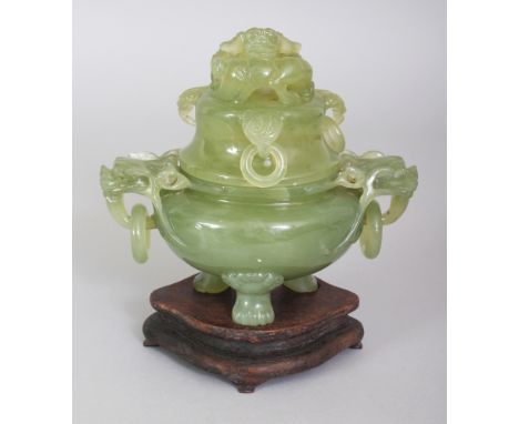 A 20TH CENTURY CHINESE CELADON GREEN JADE-LIKE HARDSTONE CENSER & COVER, together with a fitted wood stand, the sides and cov