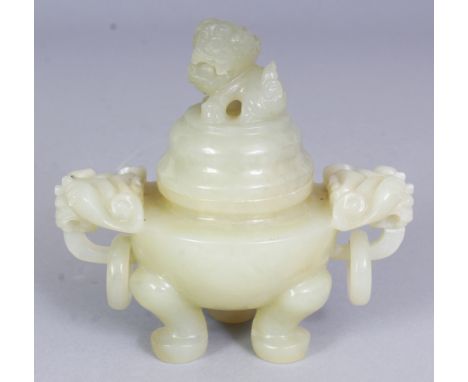 A 20TH CENTURY CHINESE CELADON GREEN BOWENITE TRIPOD CENSER & COVER, with double lion-head and loose ring handles, 4.6in wide
