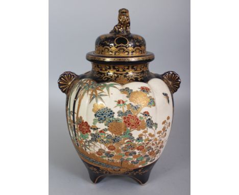 A SIGNED JAPANESE MEIJI PERIOD IMPERIAL SATSUMA EARTHENWARE TRIPOD KORO & COVER, the fluted sides painted with panels of flow
