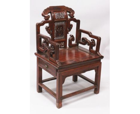 A 20TH CENTURY CHINESE HARDWOOD ARMCHAIR, with pierced lingzhi and scroll arm rests, the back with similar lingzhi and scroll