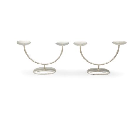CANDLESTICK HOLDERSA pair of silver plated candlestick holders. Germany, c.1970. 29 x 8 x 18cm (h)