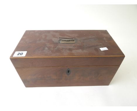 A 19th century mahogany rectangular shaped tea caddy with fitted interior