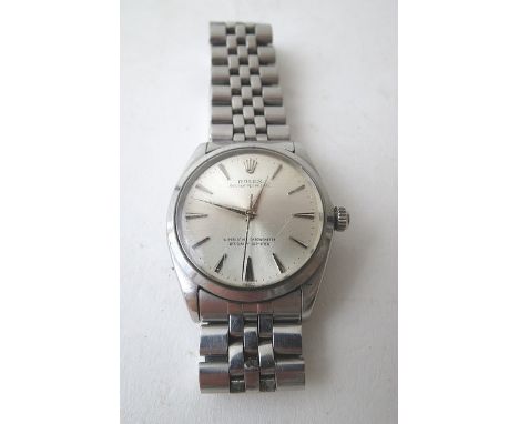 A gents 1960s Rolex Oyster Perpetual Superlative Chronometer, stainless steel wrist watch Ref. 1002 having a silvered dial wi