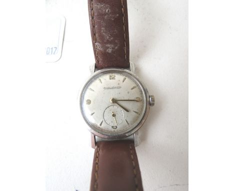 A 1940s gents stainless steel Jaeger LeCoultre wrist watch with subsidiary seconds and fancy lugs, on a later leather strap