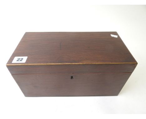 An early 19th century exotic hardwood, string inlaid tea caddy with fitted interior