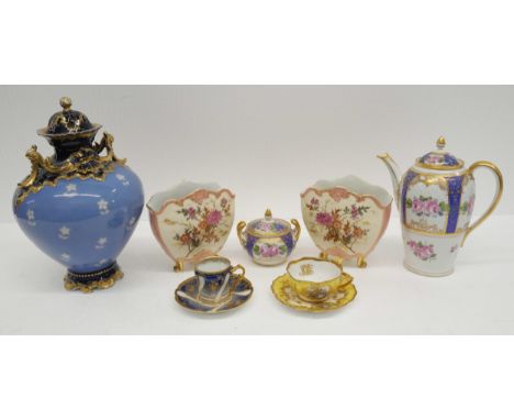 A large Limoges twin handle urn vase with lid, having central floral scene and gilt decoration. Together with a pair of DR Co
