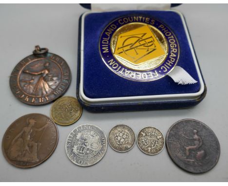 A Victorian 1900 silver one shilling, other coins, a medallion, etc.
