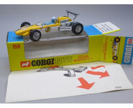 A Corgi Toys Cooper-Maserati F1 die-cast model racing car with driver controlled steering, detailed engine, boxed, number 159