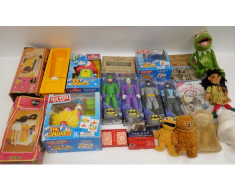 A box of toys, including DC figures Batman, The Joker and The Riddler, Wallace and Gromit, Sindy Bath, Kermit the Frog and mo