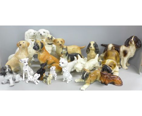 A mixed collection of ceramic dog figures **PLEASE NOTE THIS LOT IS NOT ELIGIBLE FOR IN-HOUSE POSTING AND PACKING** 
