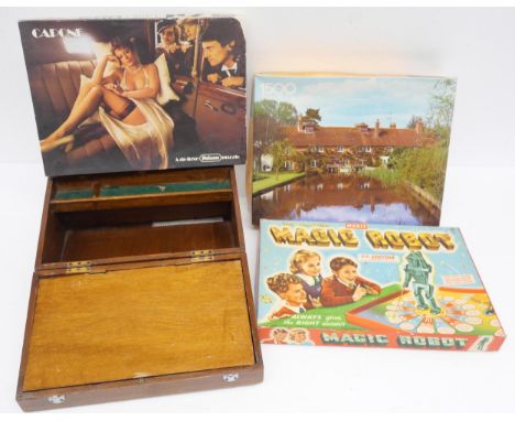 A large collection of boardgames, dartboard, wooden chess set, wooden art box, games include monopoly, The Magic Robot, Spiro