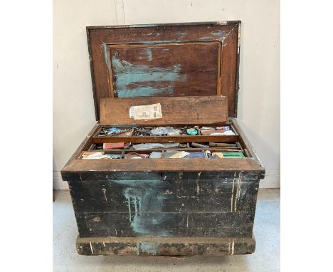 A large vintage wooden steal banded tool box with cast iron handles containing and extensive collection of vintage tools 