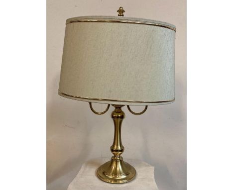 A brass two armed table lamp 