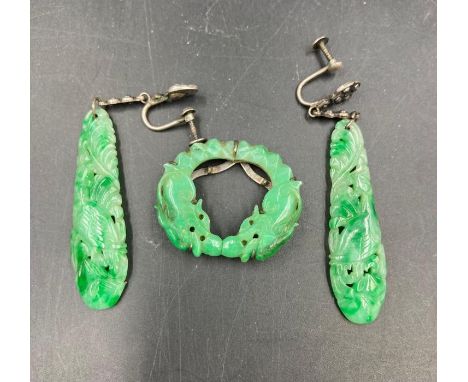 A Jade brooch and earring set.