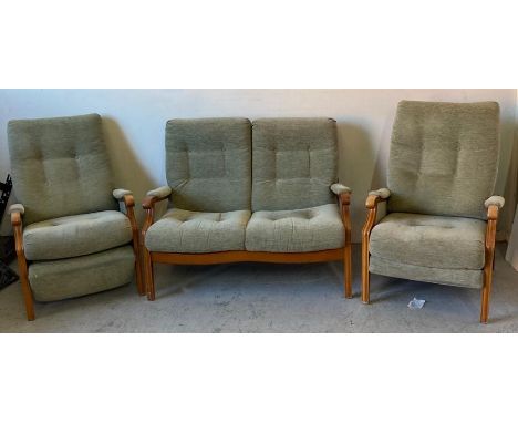 A Cinque of London two seater sofa and two reclining arm chairs 