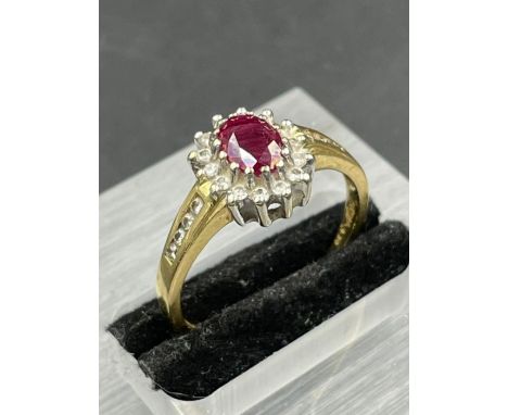 An 18ct gold ruby and diamond ring 0.33ct in total (Approximate Total Weight 4.2g) Size T1/2