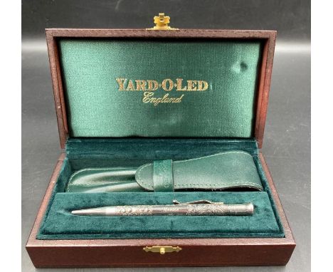 A Yard O Led silver pencil, with engraved decoration and Nanna on the cartouche in wooden presentation box and black cardboar