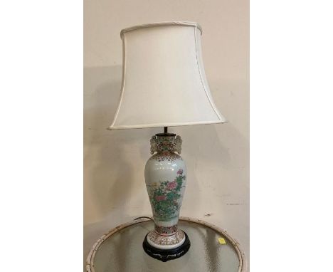 A Chinese style table lamp with floral motif 