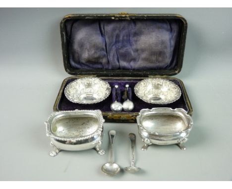 A CASED PAIR OF SILVER SALTS WITH SPOONS, Birmingham 1904, circular with embossed decoration along with two rectangular salts