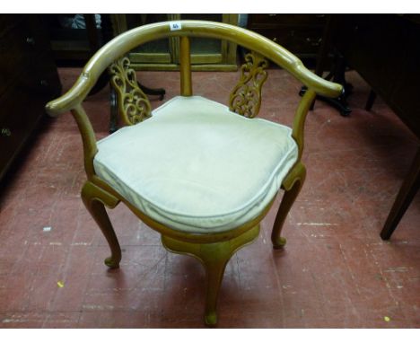 A CHINESE ROSEWOOD CORNER CHAIR with carved scroll splats and swept arms on shaped supports, 71.5 cms high, 68 cms wide, 52 c