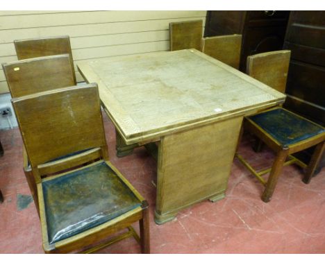 A LIGHT OAK POLISHED DRAW LEAF DINING TABLE and six similar period curved back dining chairs with drop-in seats