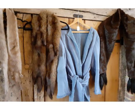 A 1970's pale blue suede open coat with wide wrap-over belt together with 3 vintage fur stoles, one a dark brown mink stole w