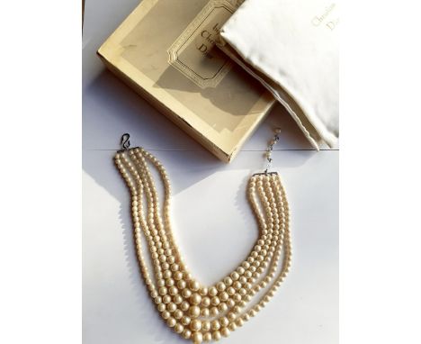 Christian Dior-A 1960's Bijoux five strand costume pearl necklace on silver tone clasp stamped with the designer's mark and d