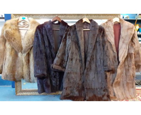 Four vintage fur coats to include a Retro fox jacket, a brown knee length rabbit fur coat and two, possibly ermine, coats. Lo
