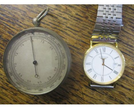 A Longines wristwatch with quartz movement, Roman numerals and date calendar at 3, on a Casio stainless steel bracelet, along