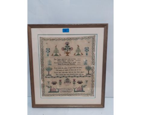 An 1824 sampler worked by Mary Grace Slatter, framed, 33cm x 38 cm. 