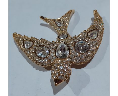 Christian Dior-A vintage gold tone and white stone brooch in the form of a swallow, stamped ChrDior to the reverse, 7cm long,