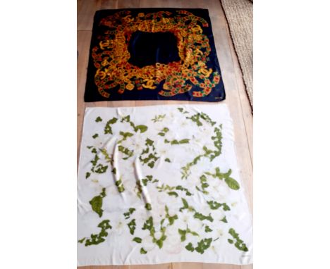 Chanel-Two vintage silk scarves comprising a blush ivory example with images of ivy, white roses, rose-hips and other flora, 