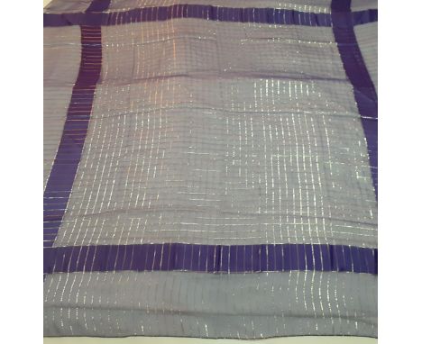 An Yves Saint Laurent shawl and one other shawl comprising an oversized Charles Jourdan Boutique shawl with purple ground and