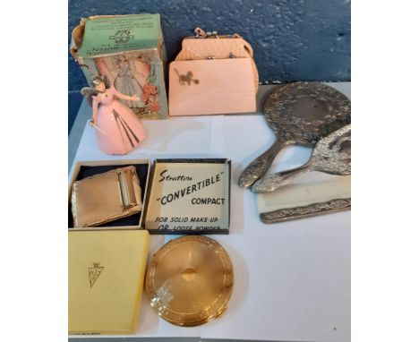 Vintage dressing table items to include a silver coloured brush set, 2 compacts and a mechanical fairy queen model No. 9/16. 