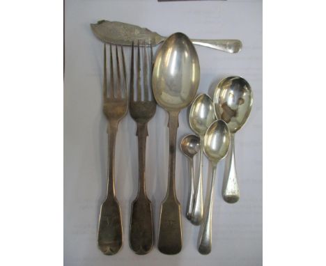 Mixed silver cutlery to include a fork and spoon with family crest to the handles, 202.6g 