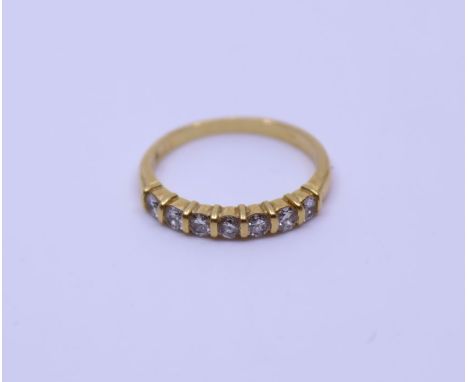 A Seven stone diamond gold ring