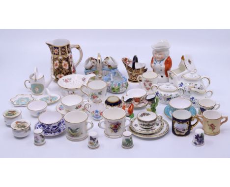 A collection of hand painted and porcelain miniatures including Worcester , Derby and similar&nbsp;
