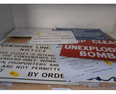 tray of enamel advertising signs