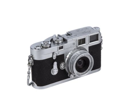 An Ernst Leitz Wetzlar GMBH Leica M3 1955 camera serial number 779806 with an Elmar f=5cm 1:3.5 Nr 1147204 lens.No service hi