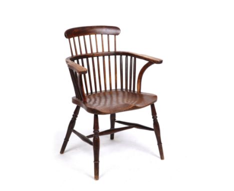 A mid 19th century English ash and elm comb back Windsor armchair with turned supportsHeight floor to top of back: 88.5cmWidt