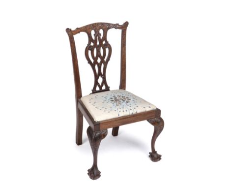 A Victorian Chippendale style mahogany child's chair with pierced splat back, cabriole legs and claw and ball feet, 45cm wide