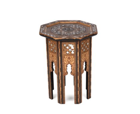 A Moorish/Syrian mother of pearl inlaid octagonal occasional table circa 1900 40.5cm wide 53cm highLot 103 Several areas of i