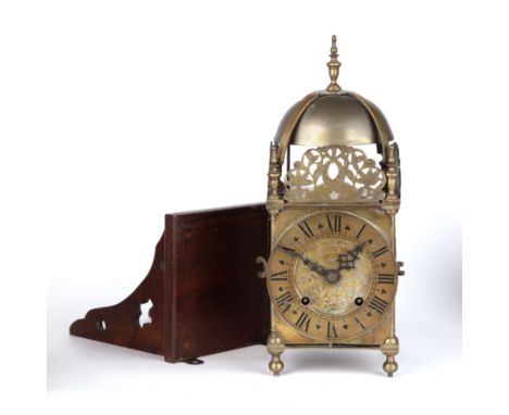 A 19th century brass lantern clock inscribed Jos Knibb 16cm wide 38cm high together with a later bracket&nbsp;