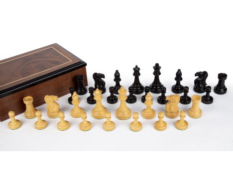 A late 20th century Staunton carved ebony and boxwood chess set probably Jacques of London the king 10cm high In an inlaid wa