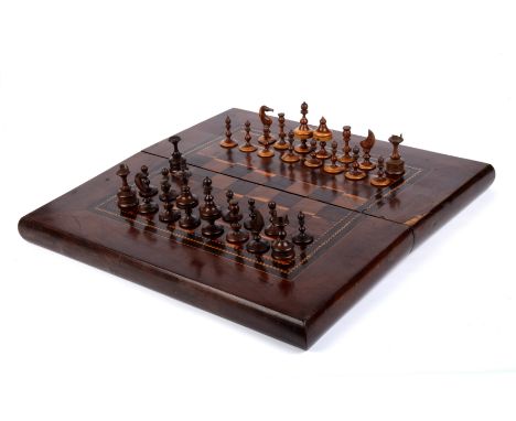 A 19th century yew wood marquetry chess board 51cm wide together with a part turned chess set  Exterior - Surface scratches, 