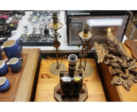 A table lamp in the form of pulley and two other table lamps all lacking leads 
