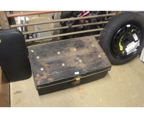 A metal twin handled travel trunk 