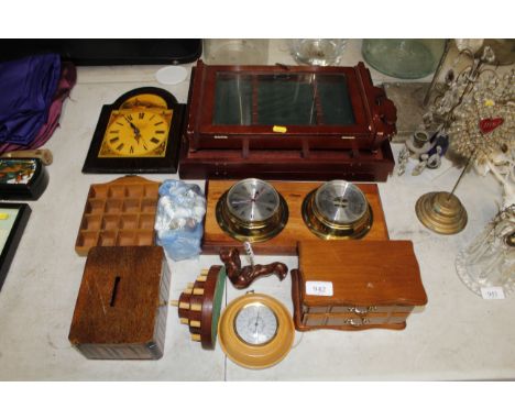A clock barometer set, a trinket box, money box, collection of thimbles on a stand etc.